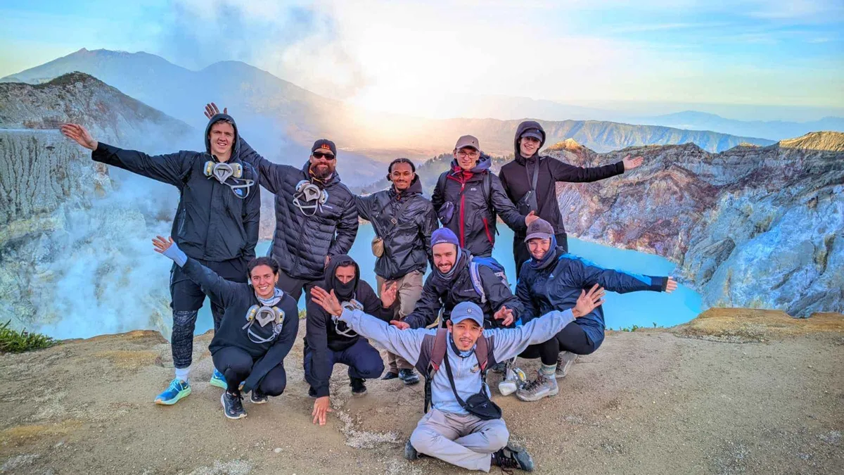 Blue fire glowing in the dark crater on a private night Mount Ijen tour